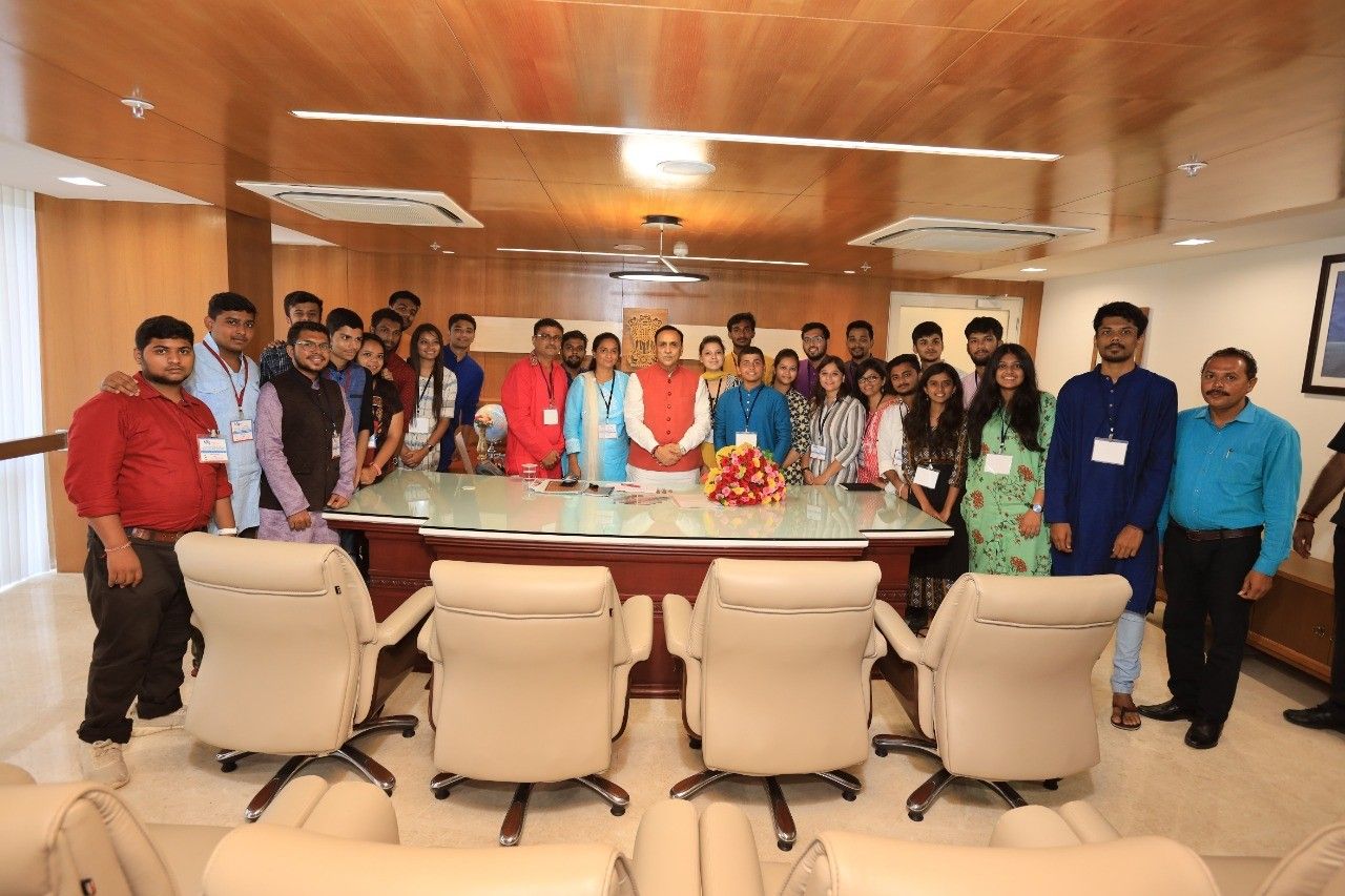 Samaj youth delegation at a meeting with a dignitary