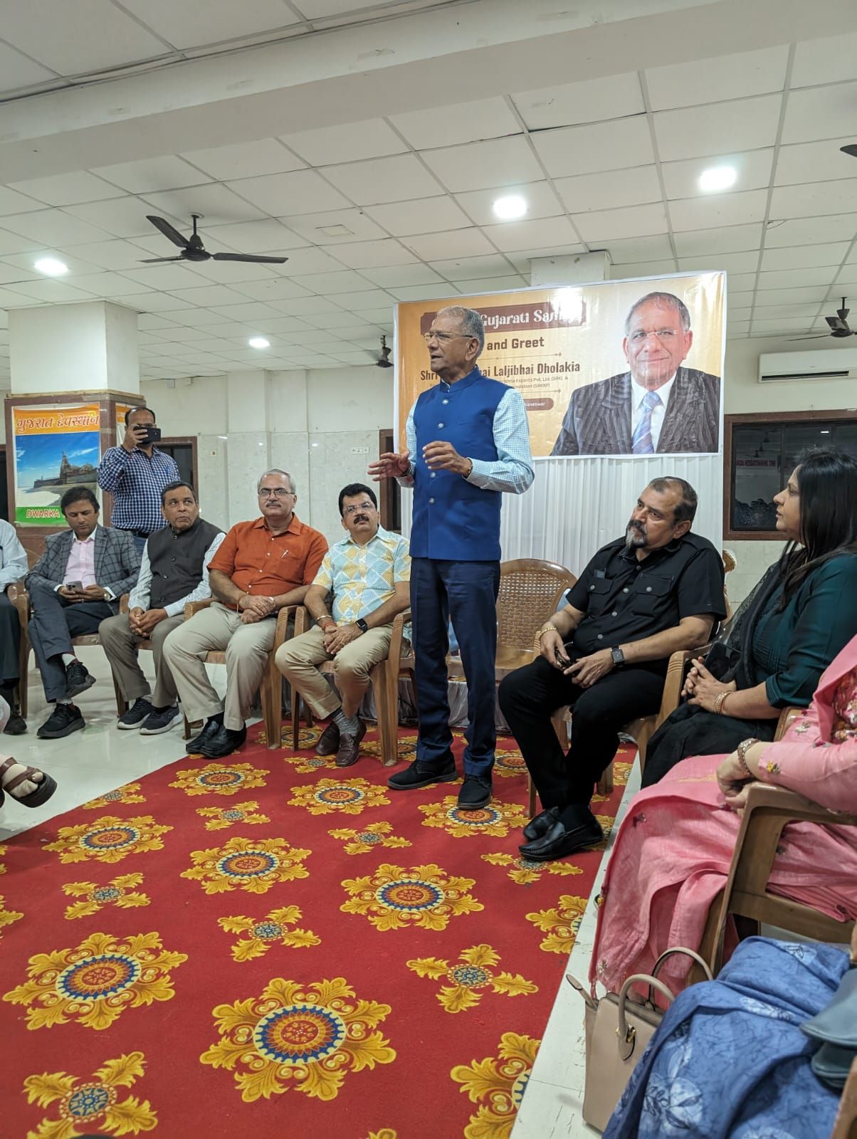 Govind Dholakia speaking to the audience